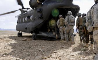 Regiment, 173rd Airborne Brigade Combat Team, and their Afghan National Army and police counterparts fly in two CH-47 Chinook helicopters, headed for the village of Kwajangur for the first time, June