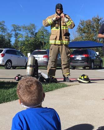 The students learned how to crawl low to get out of a fire.