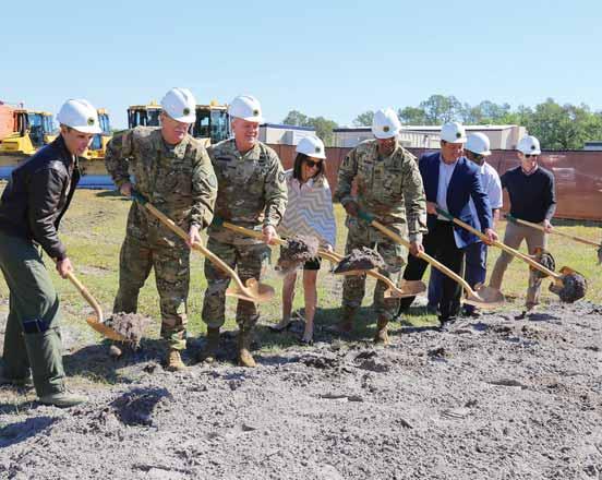 81st Readiness Division Construction workers and executives, civic leaders, to include breaking ceremony at the future site of the 81st Readiness Division mand.
