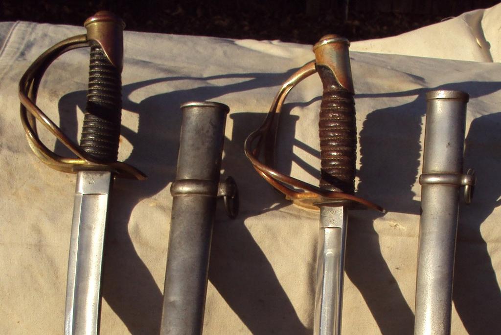 Cavalry and Dragoon Sabers by the N. P. Ames Co. By James Neel The newer version came with a narrower and therefore lighter, overall blade with a rounded rather than a flat back.
