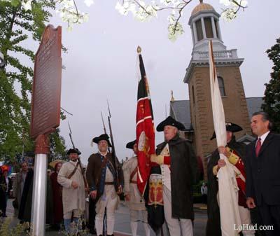 ( Ricky Flores / The Journal News ) American revolutionary troop re-enactors fire on
