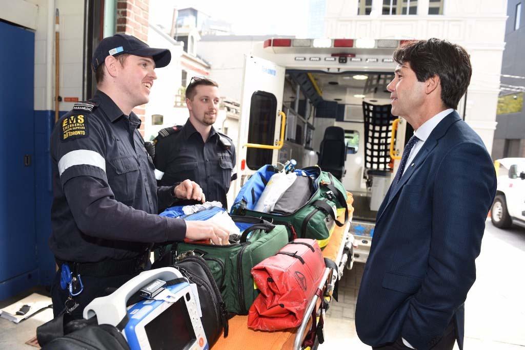Discussing Ontario's Latest Actions Against the Opioid Crisis Left to Right: Advanced Care Paramedic John McPhee, Advanced Care Paramedic Sébastien Dube and Minister Hoskins in Toronto on May 24,