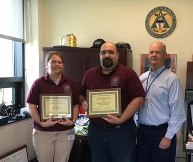 Basic emergency management certification from Tom Sullivan (right),  Congratulations to Department of Public Safety