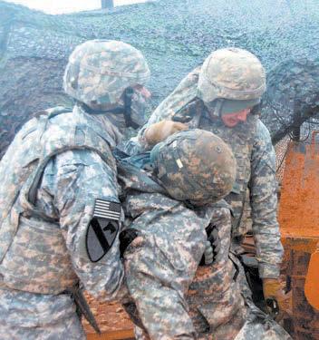 , 52nd ADA WESTERN EUROPE Soldiers assigned to 5th Battalion, 52nd Air Defense Artillery, conducted a comprehensive site defense exercise in the midst of a constant drizzle that quickly turned their