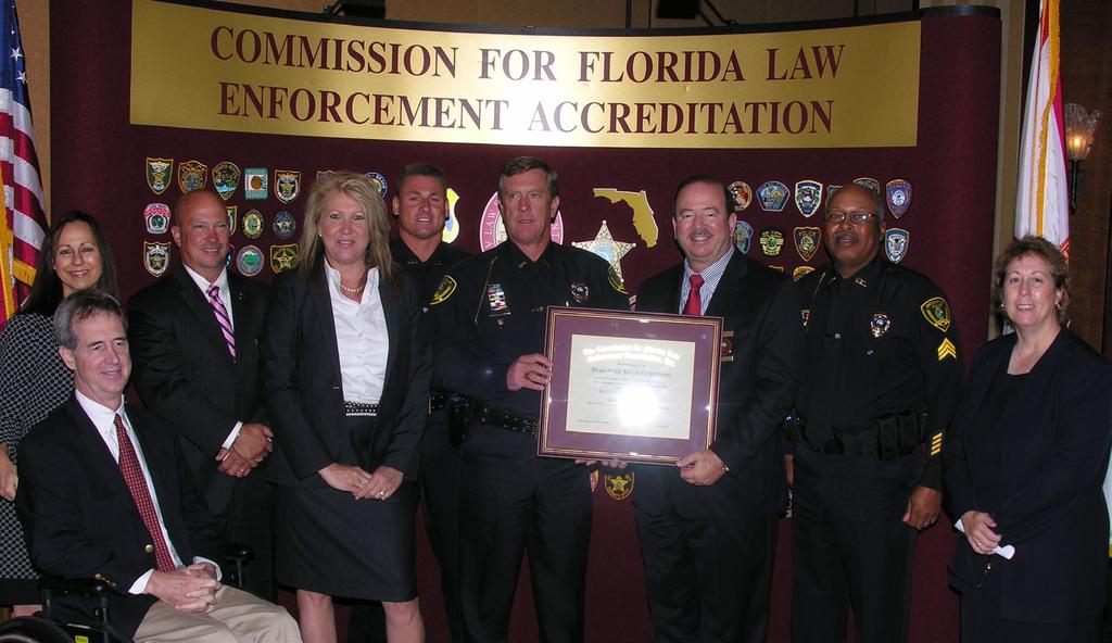 Brooksville Police Department CFA recognized the recipients of the Commission s annual awards at a luncheon hosted by the FLA-PAC. The 2010 Accreditation Manager of the Year is Dr.