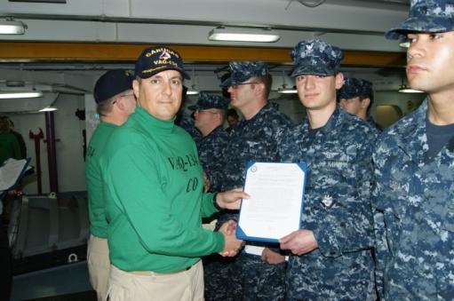 Awards were presented by Commander