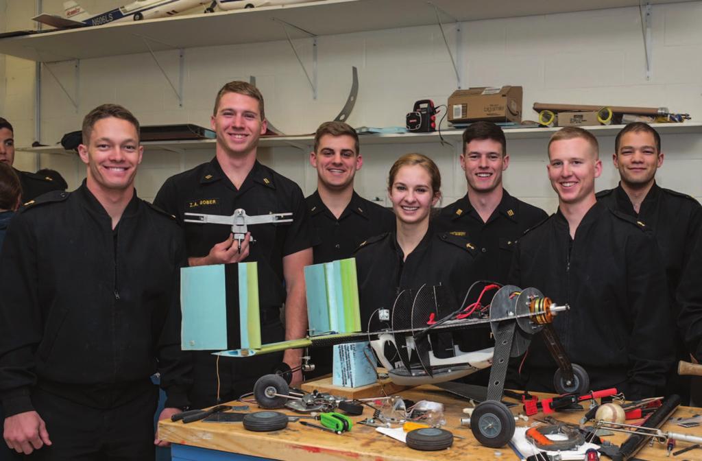Members of the Design/Build/Fly team supported by Sikorsky with their unmanned aerial vehicle (UAV).