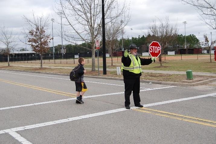 , which requires most local governmental entities that administer school crossing guard programs to train their guards according to the guidelines developed by the Florida Department of