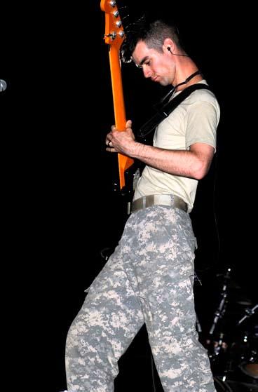 However, they re not touring in the United States, they re in Iraq. They rocked a small stage set up on the basketball court at Forward Operating Base Falcon in Baghdad, not a bar.