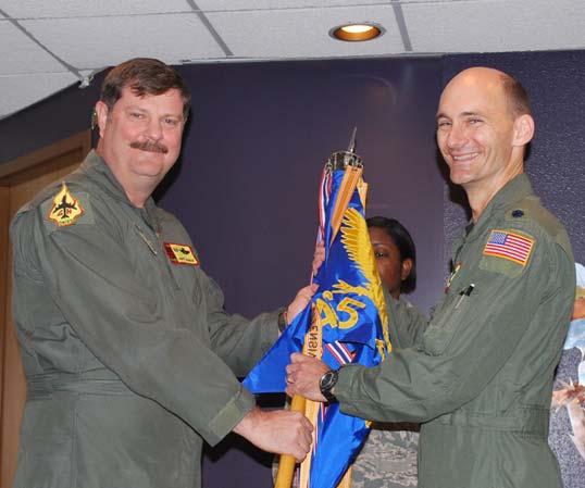 CHANGE OF COMMAND Lt. Col. Thomas Hudnall accepts command of the 465th Air Refueling Squadron on April 10, 2010 from Col. Gregory Gilmour, 507th Operations Group commander.