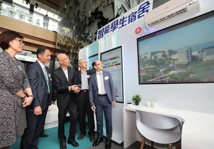 Photo 5 Another booth features Lee Woo Sing College of The Chinese University of Hong Kong which installed a high-efficiency solar energy system in its student hostel and established a rewards scheme