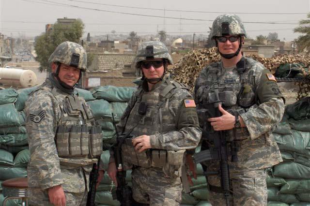 for 500 meters. 507th Security Force Squadron members standing by the old Iraqi main gate.