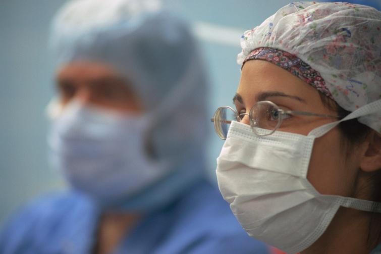 Intra-operative Prevention of SSI- Surgical Attire Head Covering Wear a cap or hood to fully cover hair on the head and face. Hospital provided scrubs.