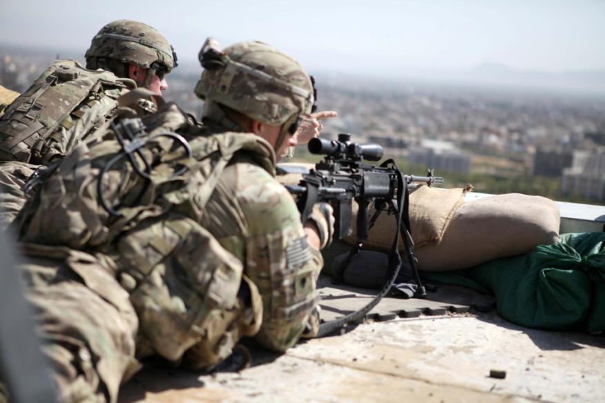 U.S. Army 1st Sgt. Sean Allison, left, and Pfc.