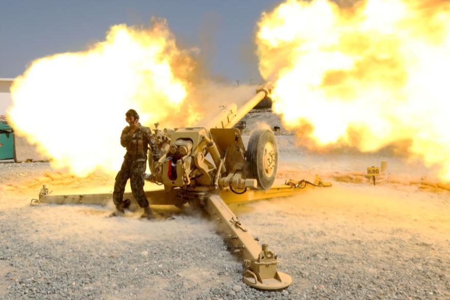 Afghan National Army soldier Awnrang Zeb, 2nd Kandak, 201st Corps, fires a D30 Howitzer during a live fire exercise on Forward Operating Base Metharlam, Laghnam province, Afghanistan,