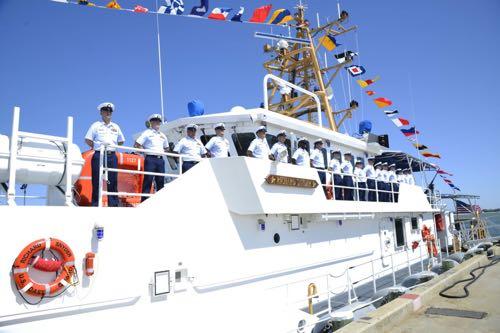 ATLANTIC BEACH, NORTH CAROLINA - The crew of Coast Guard Cutter Richard Snyder mans the rails during the commissioning ceremony for the cutter on April 20, 2018.
