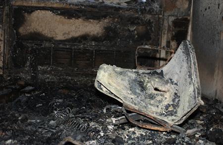 A fire-damaged chair lies inside an office on the fourth floor of the Pentagon (Photo courtesy of the U.S.