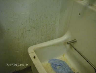 There was no hand washing sink available and a number of items, including mop heads, were on the floor.