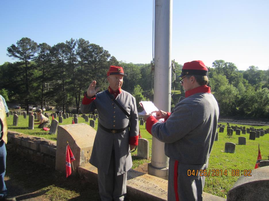 Capt. Scarborough swearing in Bobby Coleman at Rose Hill Cemetary in
