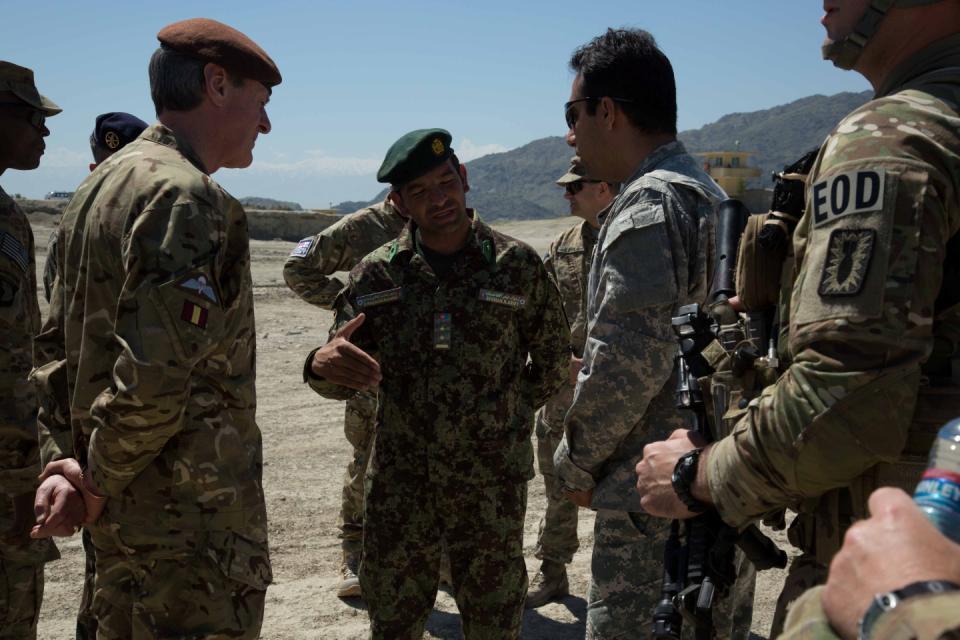 Lt. Gen. Sir Richard Shireff(left), the Deputy Supreme Allied Commander of Europe(DSACEUR), speaks with Afghan National Army(ANA) 2nd Lt.