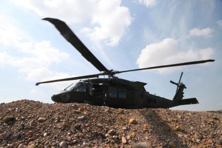 A UH-60 Black Hawk helicopter prepares to take off of the landing zone outside of Combat Outpost Koh-E-Safi, Afghanistan, March 12, 2014.