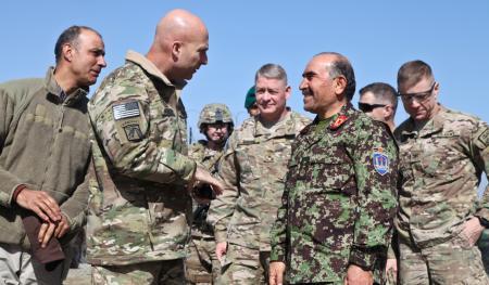 U.S. Army Lt. Gen. Joseph Anderson, commander of the 18th Airborne Corps, greets Afghan National Army Maj. Gen. Mohammad Yaftali, commander of the 203rd Corps sat Forward Operating Base (FOB) Thunder, Paktia province, Afghanistan, March 5, 2014.