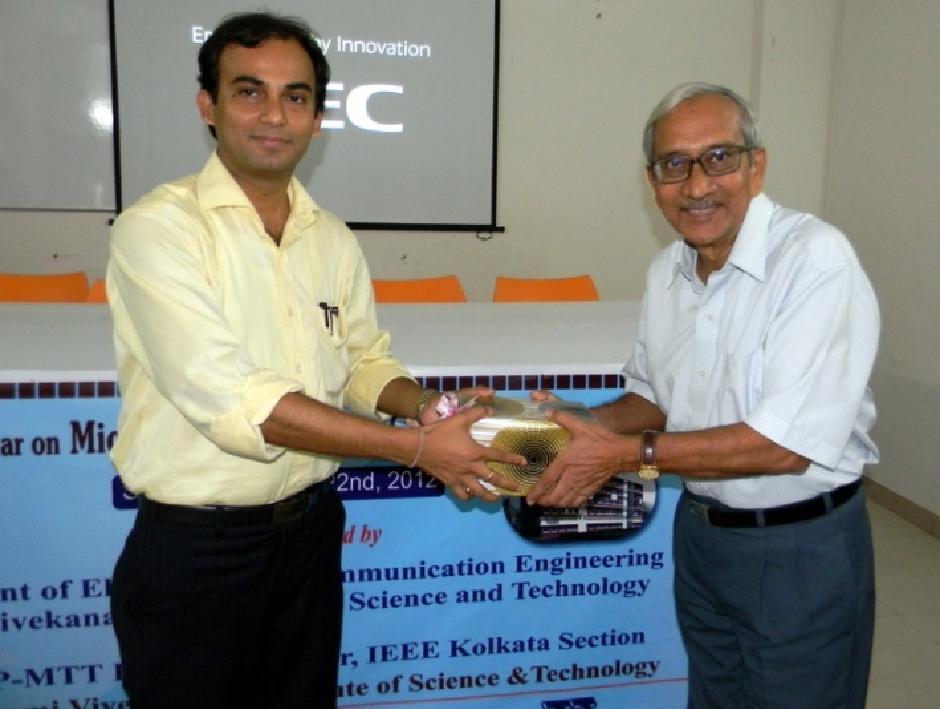 Figure 4: Dr. Chinmoy Saha HOD, ECE Figures 5 Valedictory Session (1) Department giving a token memento to Prof. P.K.
