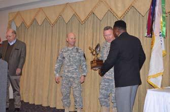General Membership Meeting Receiving the trophy for the 2014 AUSA National Largest Active Duty Division for Membership at the November 19 General Membership meeting are (left to right) 1st Cavalry