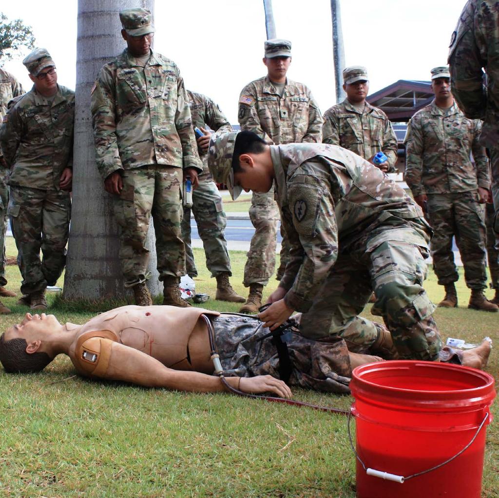 A Soldier applies a tourniquet to a mannequin during Squad Overmatch training at Schofield Barracks. Their misgivings were understandable, particularly considering their significant challenges.