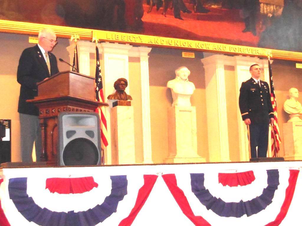cpt William j. Maloney, USA (Fmr) of the Greater Boston Chapter, announces the award of perpetual membership to 2lt Patrick J. Lupfer at the commissioning ceremony at Faneuil hall.