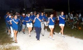 The Kwajalein High School Marching Band accompanies the 12 cancer