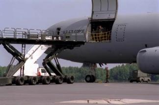 Tanker aircraft operating under the dual role concept can transport passengers and cargo while performing air refueling.
