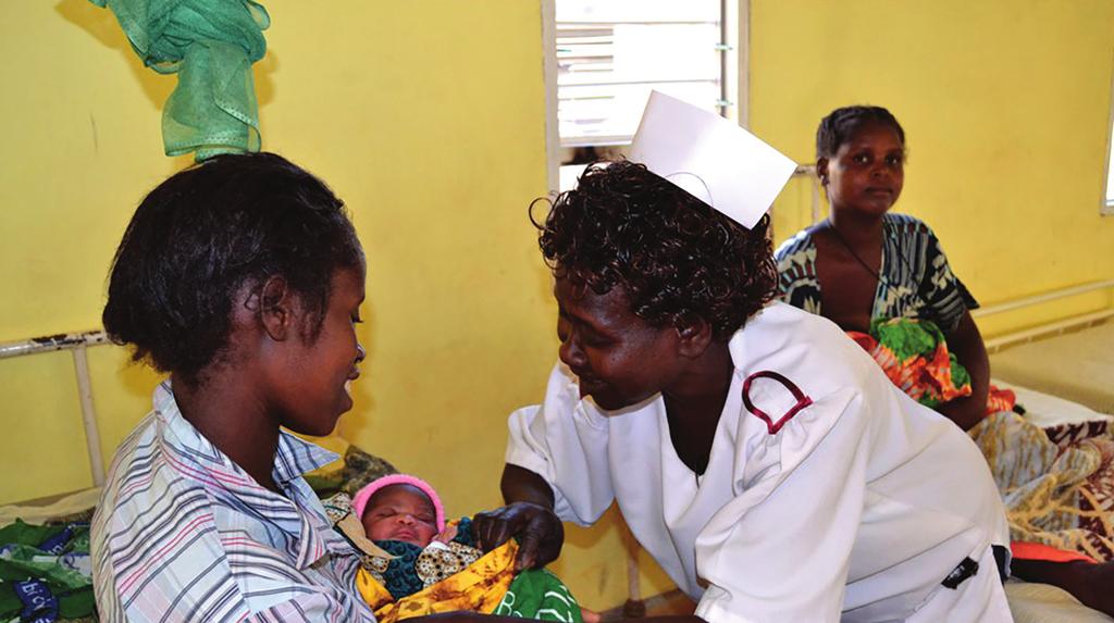 A health worker cares for an infant at Kochirira Health Centre in Malawi.