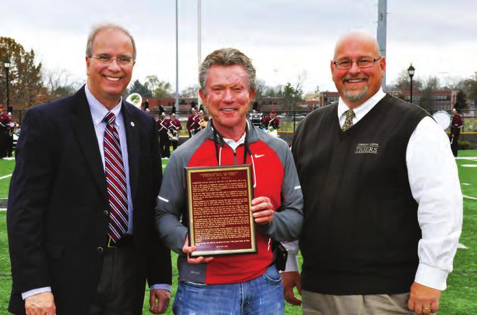 KELLY HALL INDUCTED INTO ATHLETICS HALL OF FAME, SPORTS HONORED WITH TENNIS COMPLEX NAMING By Chris Megginson, sports information director President Michael V.