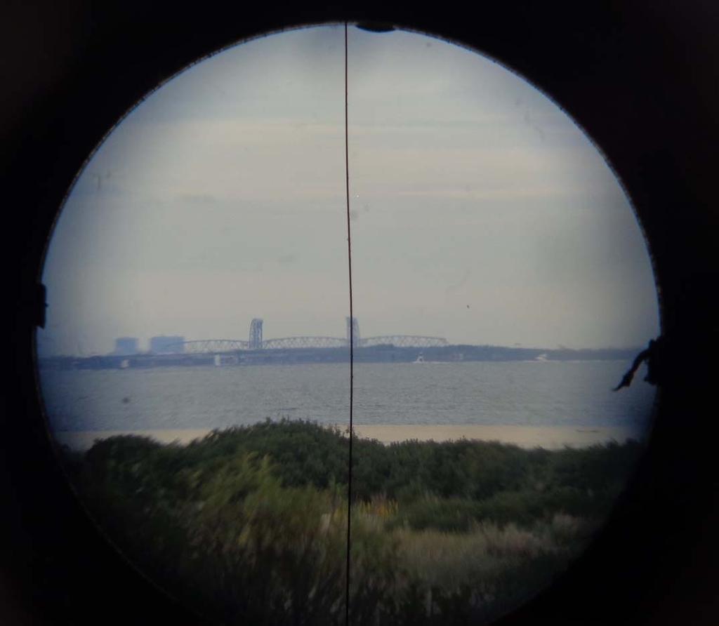 Looking through the M1904 3-inch telescopic sight on the