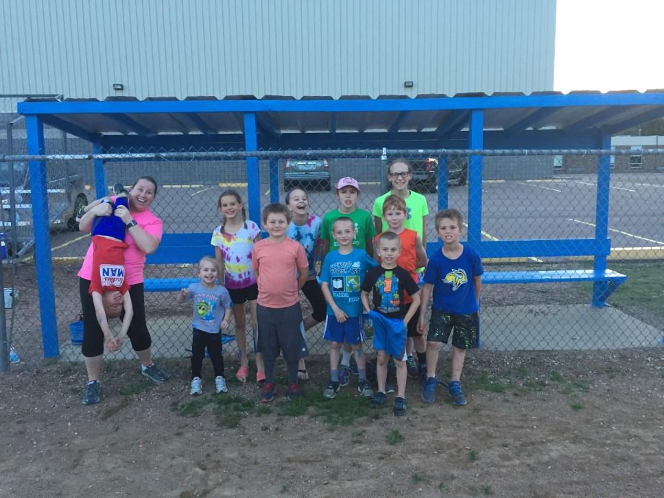 Spotlight on Service Last year, Dakota Lassies & Rangers used a club grant to fix-up a dugout in the community. As you can see, the 4-Hers really enjoyed being able to do their part.