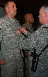 (Promotable) Bell Jones, 335th Signal Command (Theater) on March 12. Left, 1st Lt.