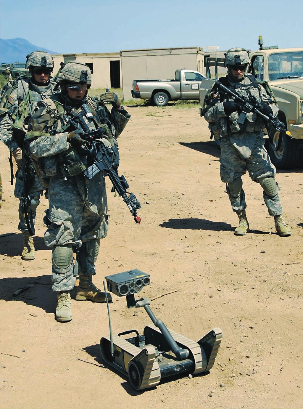 SPC Joshua Whiteland, Company C, 2nd Combined Arms Battalion, maneuvers a small unmanned ground vehicle (SUGV) Block 1 during village operations. Scott R.