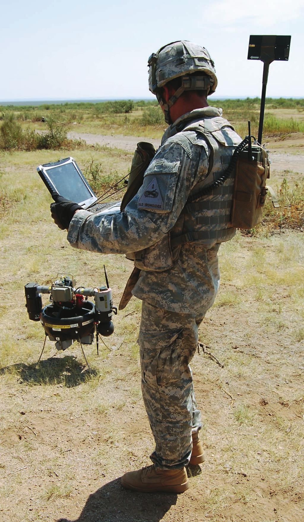 SGT Garrett Haverkost operates a Class I Block 0 unmanned aerial vehicle, one of four that Charlie Company tested.