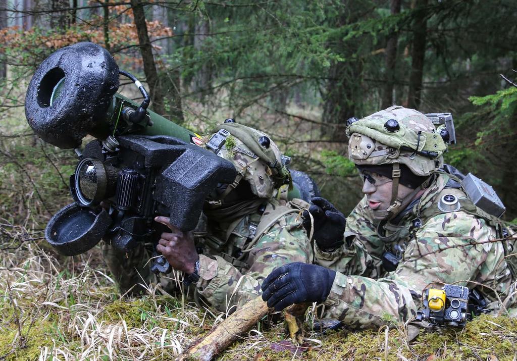 Soldiers from the 2nd Battalion, 503rd Infantry Regiment, 173rd Airborne Brigade, provide security with a training Javelin shoulder-fired anti-tank missile while conducting defensive operations