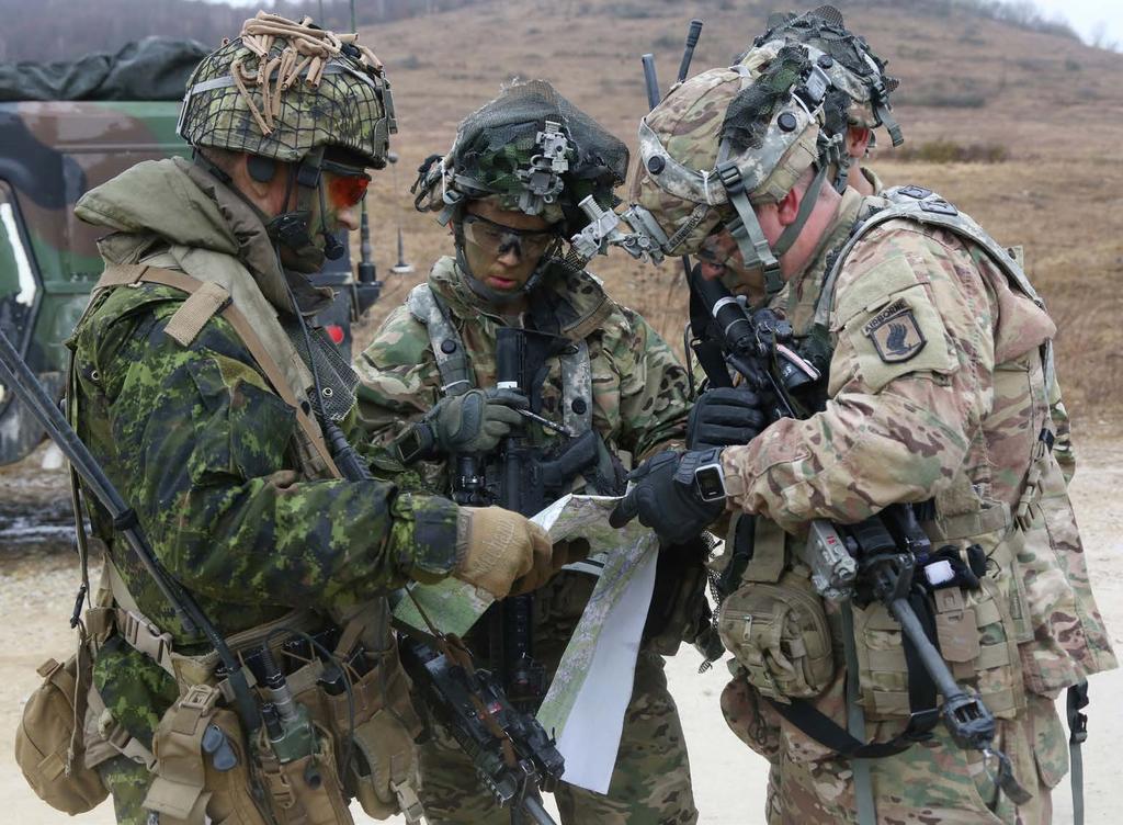 U.S. and Canadian Soldiers plan their next course of action while conducting a leader s recon mission during Exercise Allied Spirit VI at Hohenfels Training Area, Germany, on 19 March 2017.