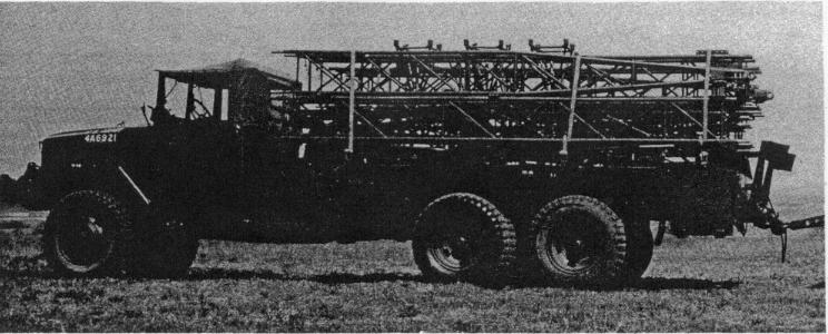 Figure 26. The erector-servicer XM478 consists of a modified 2½-ton truck on which lightweight erection equipment is transported.