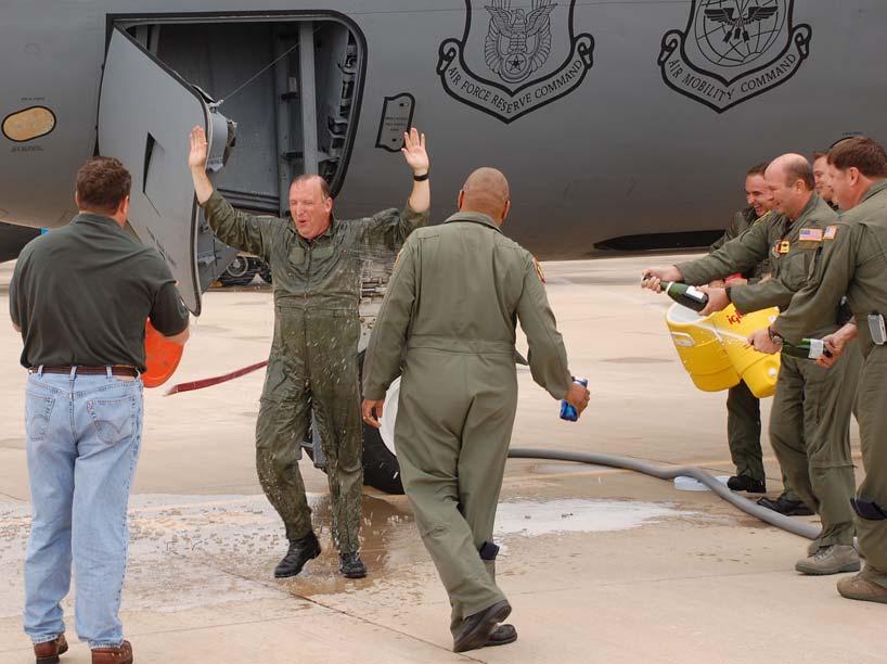 Fini Flight Col. Clayton Childs, 507th ARW vice commander, reacts to the cold water and other liquids as he completes his last flight with the 507th ARW on Sept. 3.