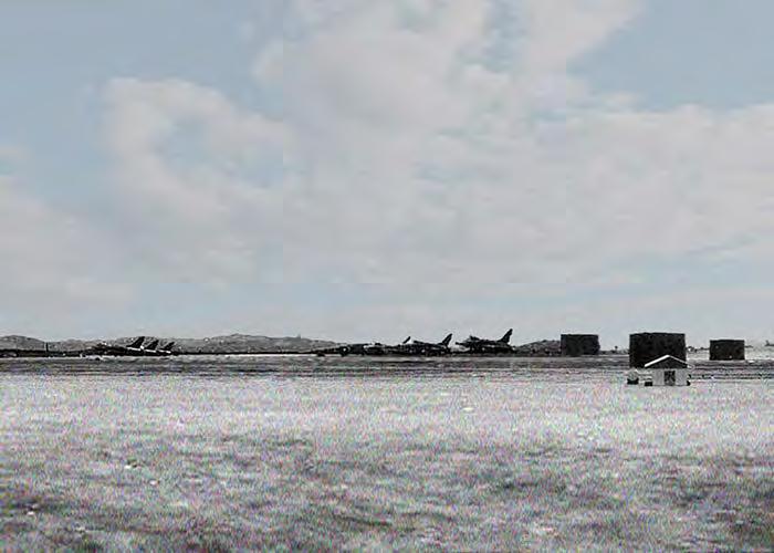 3.26_26: Phù Cát Air Base, Flightline: F-100 Super Sabres parked. Fuel Storage tanks nearby. 1967. (Photo: Sgt.