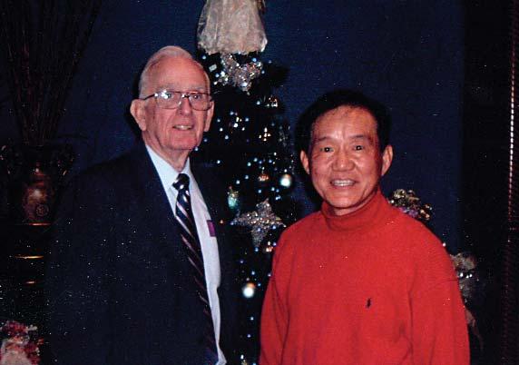 John Keun-Sang Lee, President of the Korean Community Association of Greater Pittsburgh, and his wife hosted a Christmas dinner at their home for twelve Korean War veterans and their wives.