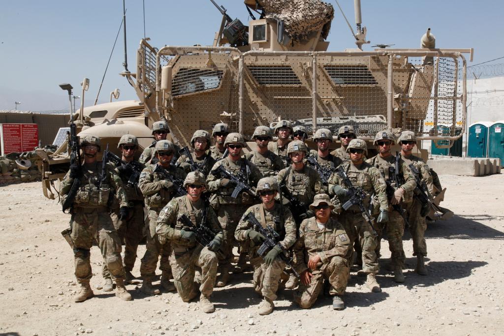 U.S. soldiers with Red Platoon, Apache Troop, 1/75th Cavalry Battalion, 2nd Brigade, 101st Airborne Division (Air Assault), pose for a