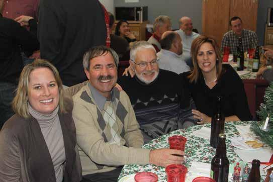 YANKEE ENGINEER 8 December 2018 Dredging up the past Sheila Winston-Vincuilla (from left), Tom Rosato, Bob Gauvreau, and Evamarie D'Antuono enjoy each other's company during the 2010 Holiday Party,
