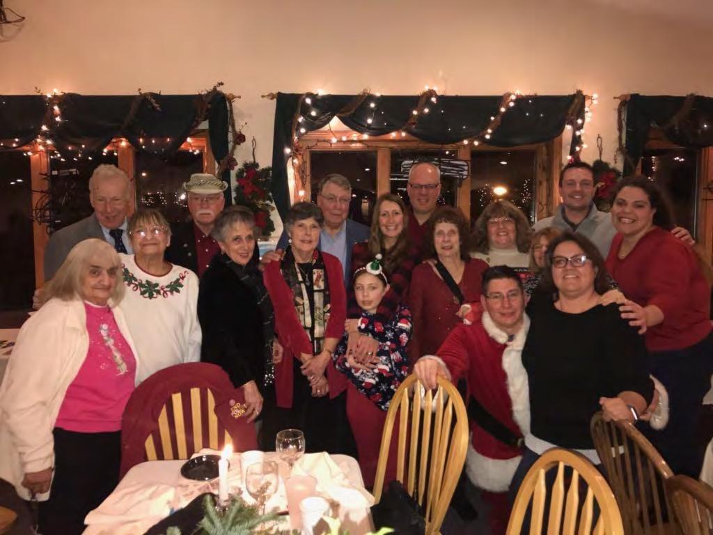 Having a special time of fellowship at Northville Rotary Club s Holiday party