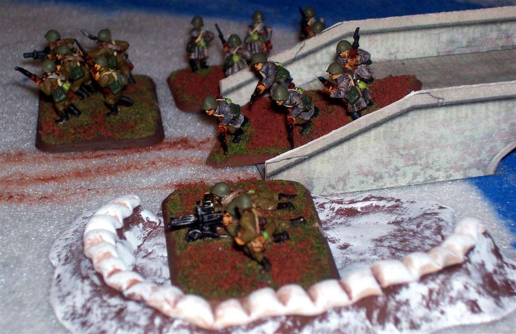 The Soviet squads defending the bridge suffer immediate heavy casualties, and it is left to a lone