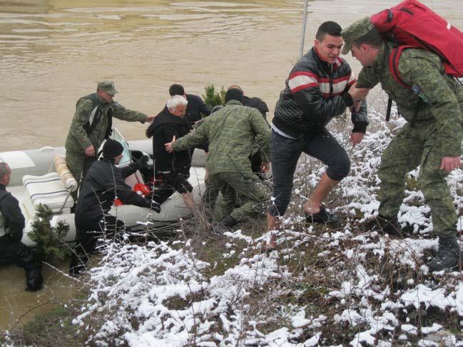 KSF HELPS CITIZENS IN FLOOD-HIT AREAS In March, the KSF Crisis Response Liaison Unit conducted an evacuation operation after flooding